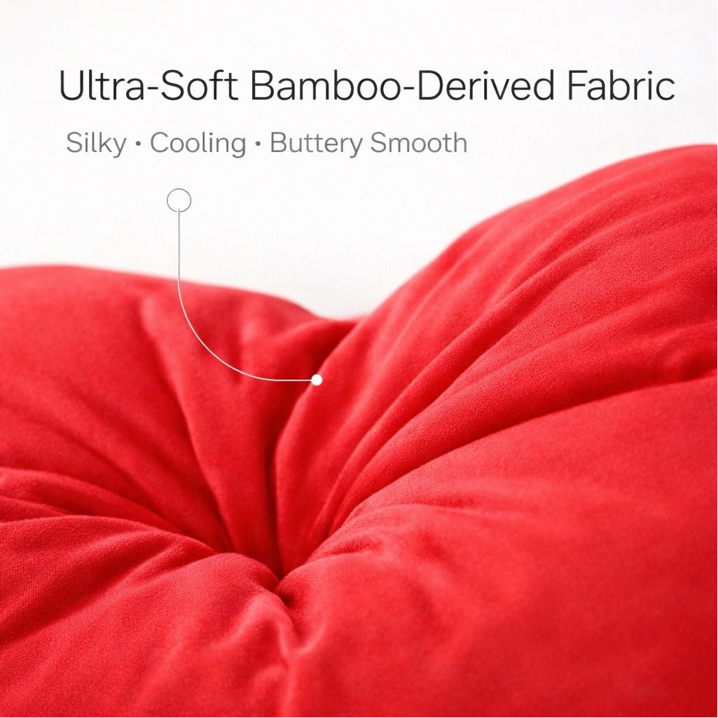 Red pillow with ultra-soft bamboo-derived fabric description on a white background