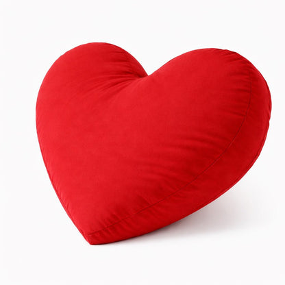 bright red heart shaped pillow made by the breakup pillow.