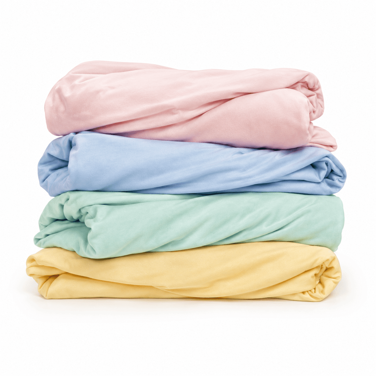 Stack of pastel folded Petty Pillowcases – customizable soft cooling bamboo covers for breakup pillows by The Breakup Pillow