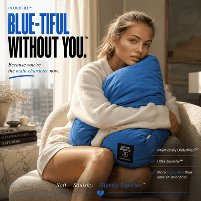 Woman on a couch holding Blue-Tiful Without You blue breakup pillow – gift for women going through a breakup by The Breakup Pillow