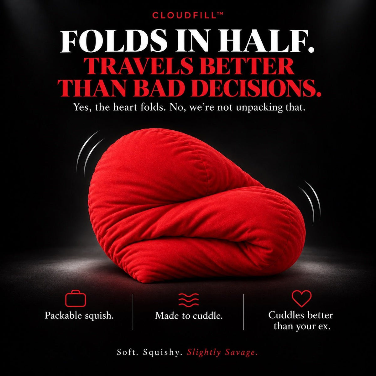 Left On Red oversized red heart cuddle pillow folded in half to show soft squishy CloudFill and packable underfilled design