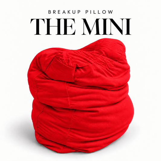 The Mini Breakup Pillow in red – Red-Y To Be Petty 16x16x3 small squishy cuddle pillow, folded and slouched