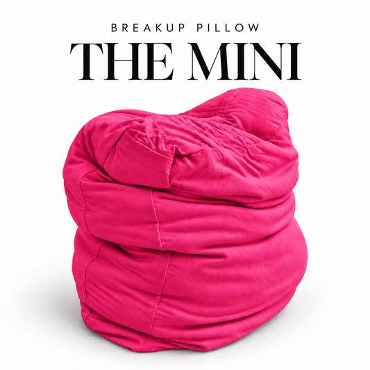 Malibu Revenge Mini 16-inch hot-pink squishy cuddle pillow from The Breakup Pillow
