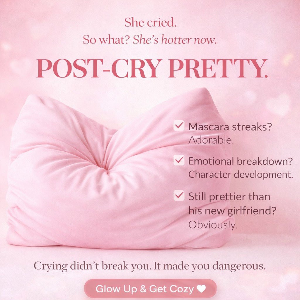 Pink pillow with humorous text about crying and being 'post-cry pretty' on a pink background.