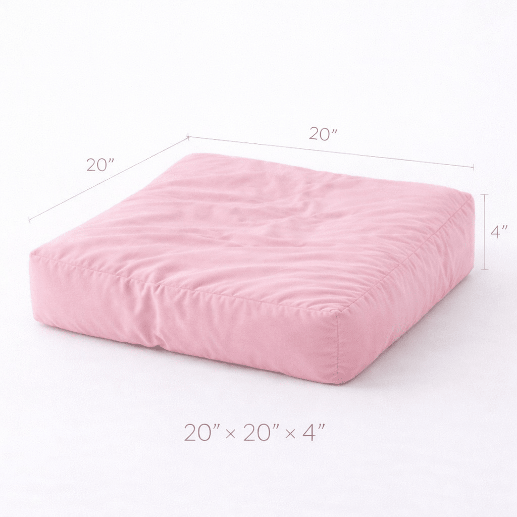 Pink pillow with dimensions labeled on a white background