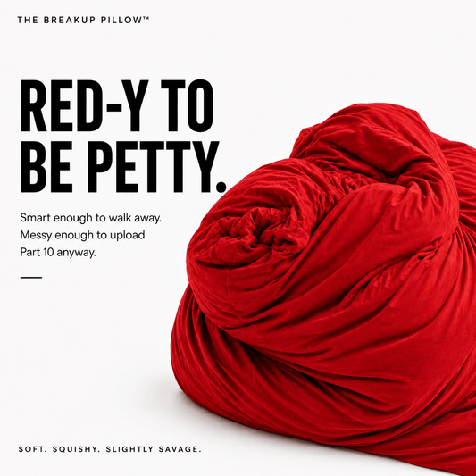 A red plush throw pillow with a wrinkled, textured surface, styled on a clean white background next to bold black text that reads 'RED-Y TO BE PETTY.'.