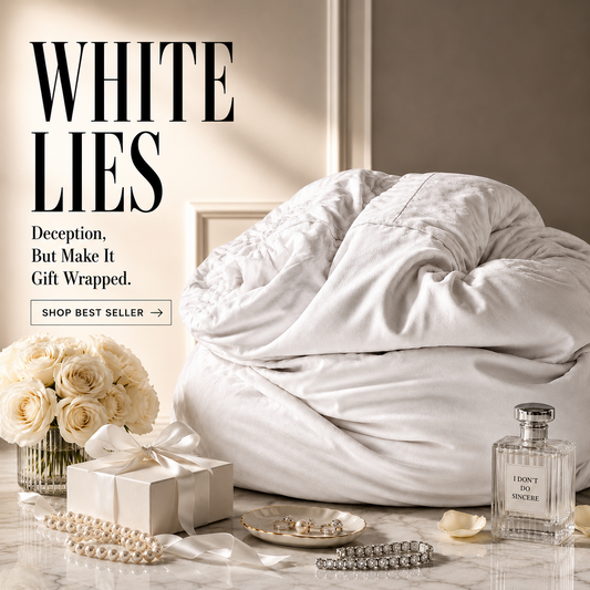 White squishy pillow on a bed with decorative items and text overlay.